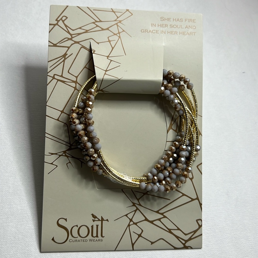 Lavendar and gold beaded bracelet or necklace.